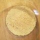 adding dry yeast to make easy pizza dough at home image
