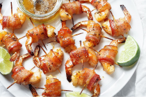 Honey-garlic Bacon Wrapped Shrimp - These crisp and sticky treats are the ultimate last-minute appetizer recipe!