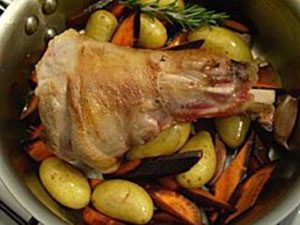 Slow cook lamb shank recipe — roasted lamb shank in oven image