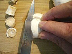 kitchen knife skills: slice mushrooms using a paring knife