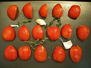 baked tomatoes recipe - homemade oven dried tomatoes in olive oil tutorial image