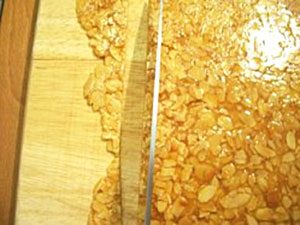 how to cut homemade almond brittle image