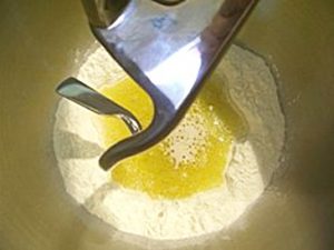 kneading pizza dough image