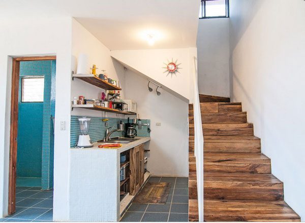 Decorating small kitchen under stairs