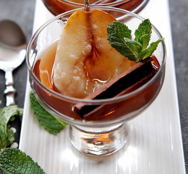 poached pear in syrup image