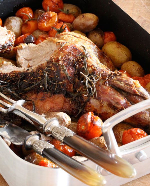 Herb-Roasted Leg of Lamb with Cherry Tomatoes & Potatoes