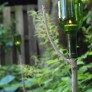 garden decor with wine bottles thumbnail