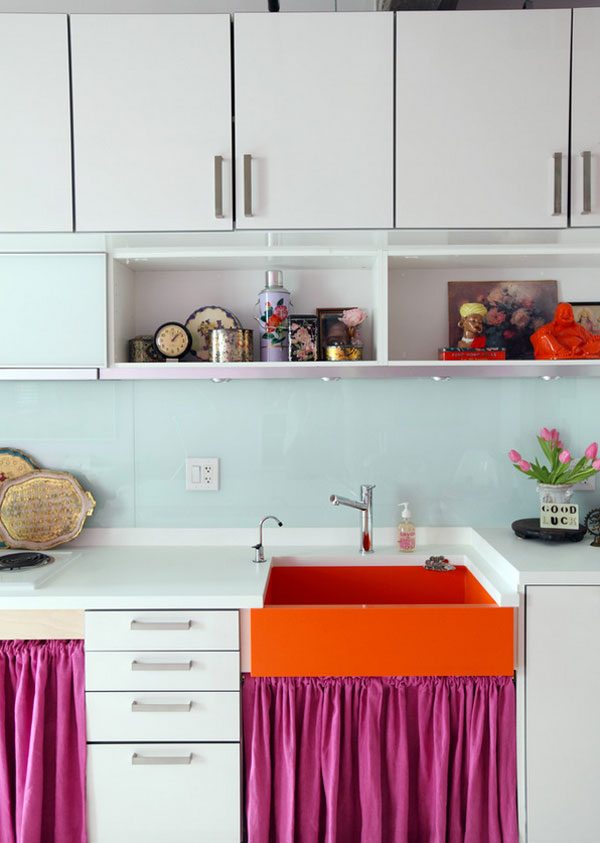 10 ways interior designers work color into neutral kitchens