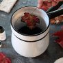 Haunted dining room with waxed black leaves thumbnail