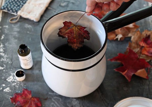 Haunted dining room with waxed black leaves