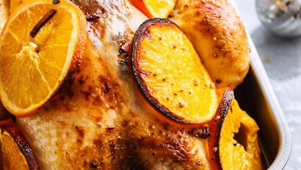 Spicy Roast Chicken For Holiday Dinners - #recipe by #eatwell101 - https://www.eatwell101.com/roast-chicken-recipe-with-orange-and-cinnamon