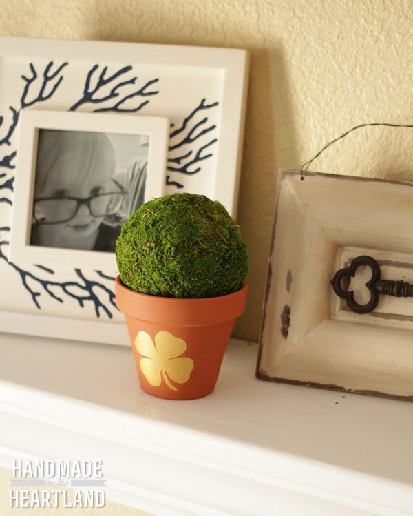 st patricks day flower pot painted with gold shamrock