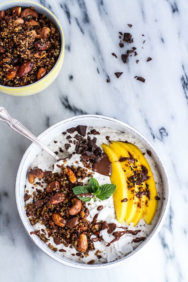 Coconut Banana Oats Smoothie Bowl with Crunchy Black Sesame Quinoa Cereal mango