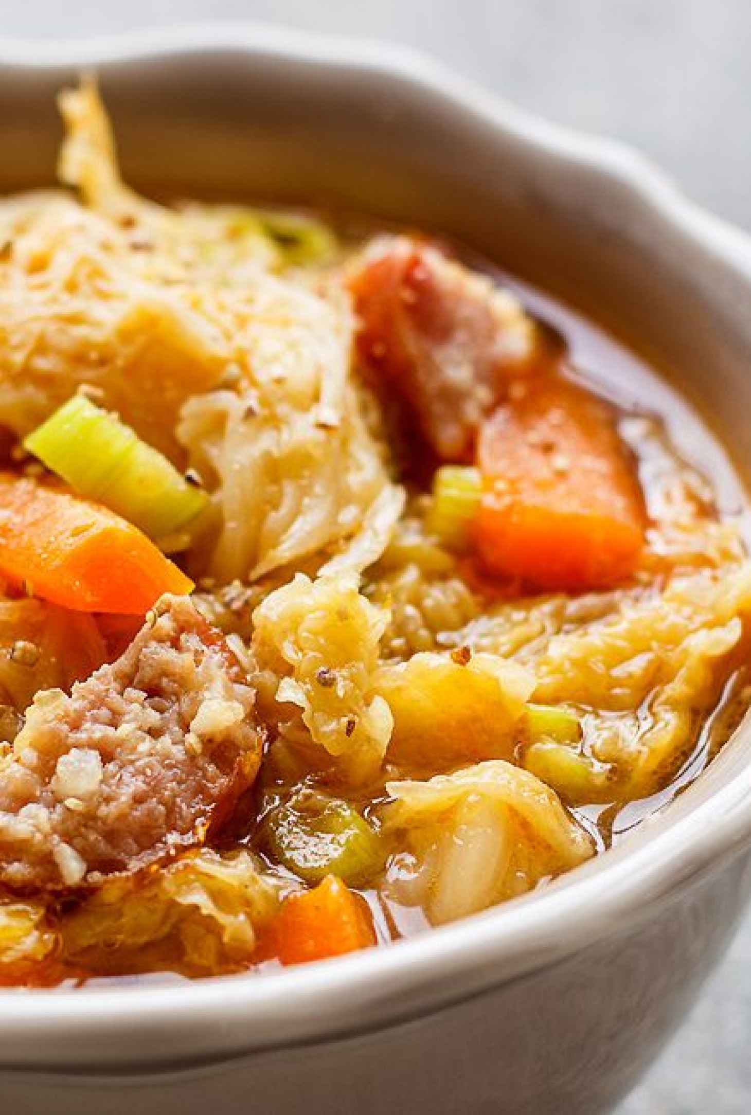 Braised Cabbage Soup with Smoked Sausage - #recipe by #eatwell101 - https://www.eatwell101.com/braised-cabbage-soup-with-smoked-sausage