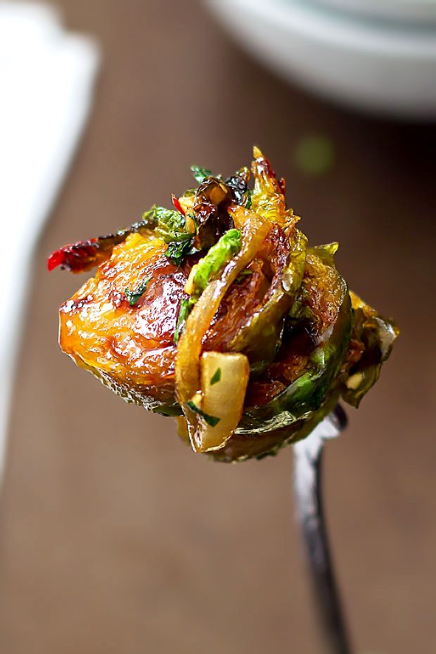 These sweet and spicy brussels sprouts caramelized at the perfection will enhance any of your main dishes. eatwell101.com