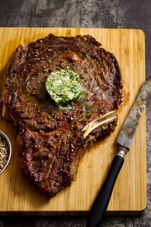Grilled Ribeye Steaks with Melting Parsley Butter