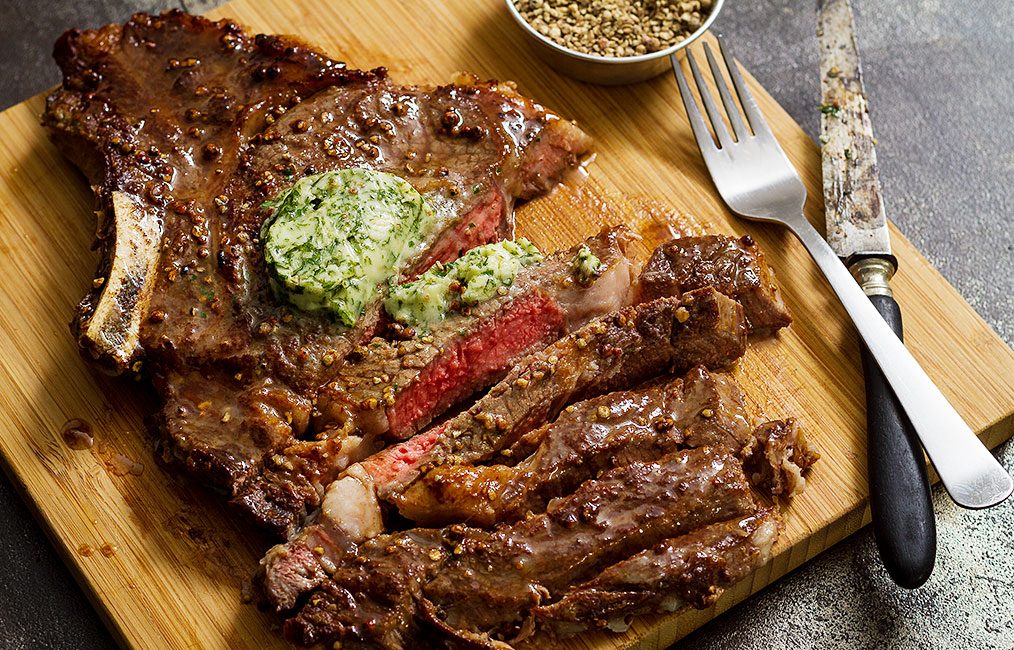 Grilled Ribeye Steaks with Melting Parsley Butter