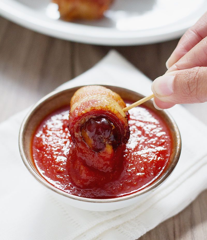 These Cheesy Bacon Wrapped Dates are so easy to throw together and the combination of crispy bacon with naturally sweet dates and creamy cheese in the middle is irresistible!