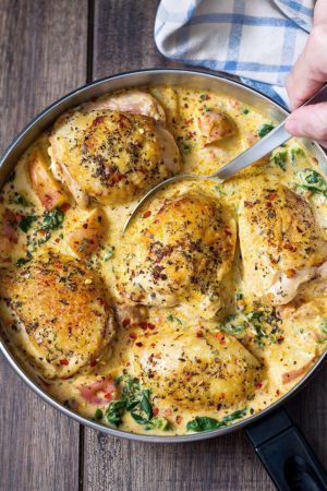 One Pan Chicken and Potatoes with Garlic Parmesan Spinach Cream Sauce