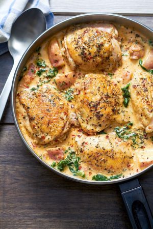 One Pan Chicken and Potatoes with Garlic Parmesan Spinach Cream Sauce