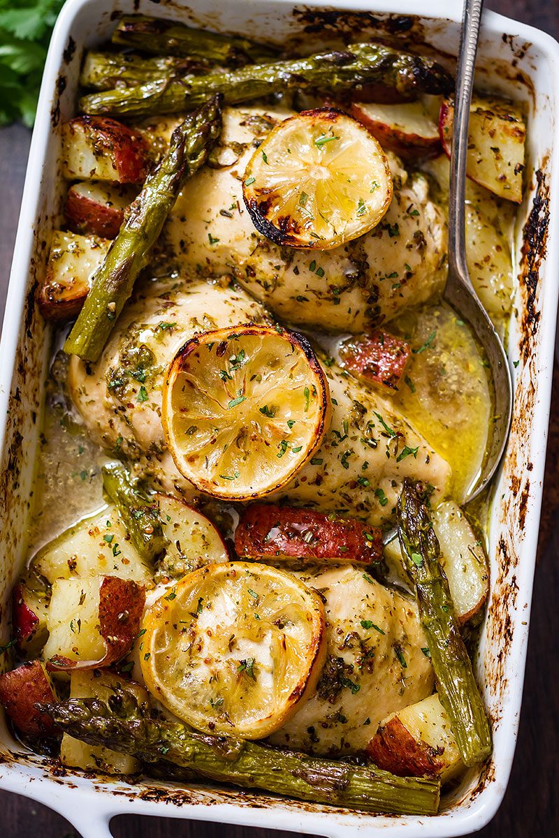 Image of a baled chicken with lemon and veggies