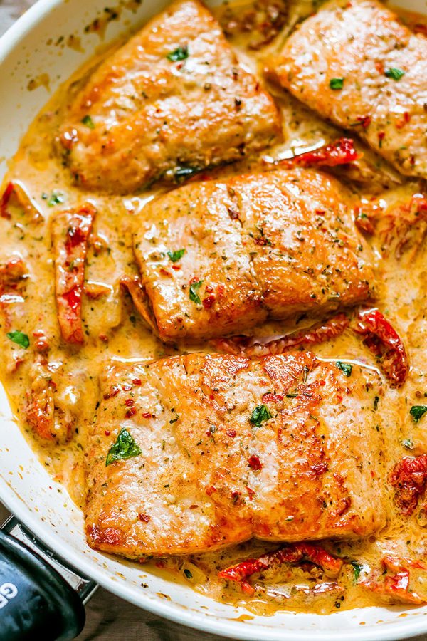 Pan Seared Salmon with Sun-Dried Tomato Cream Sauce - #recipe by #eatwell101 - https://www.eatwell101.com/pan-seared-salmon-recipe