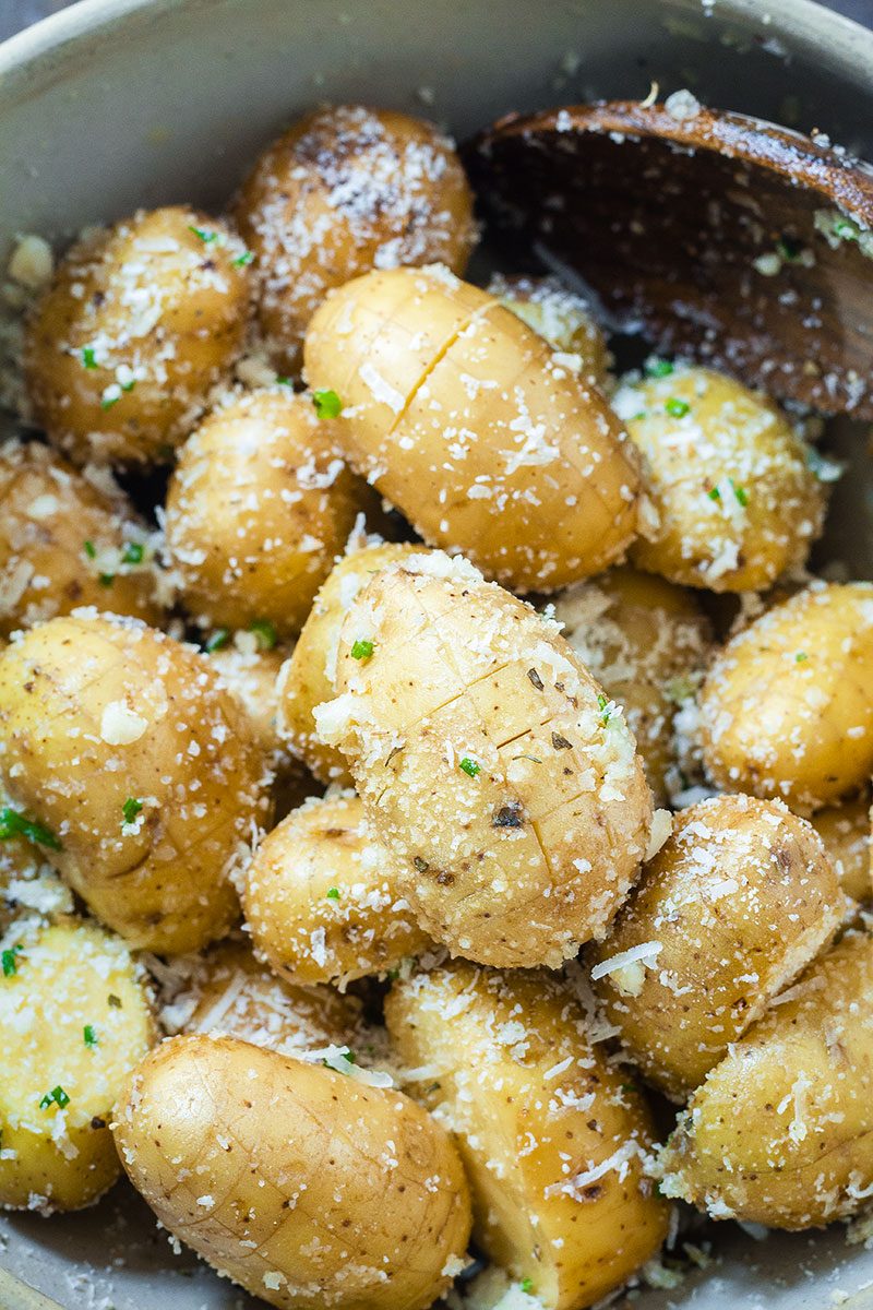 Cheesy Garlic Roasted Potatoes – Crunchy golden exteriors, soft and creamy inside. A great side dish to share with a crowd!