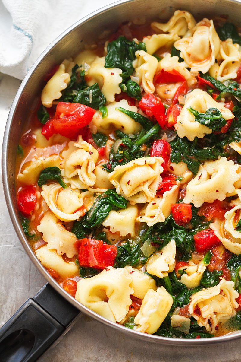One-Pan Tomato Spinach Tortellini — Easy, healthy and family friendly, on the table in 20 minutes. The perfect answer to your weeknight dinner prayers!