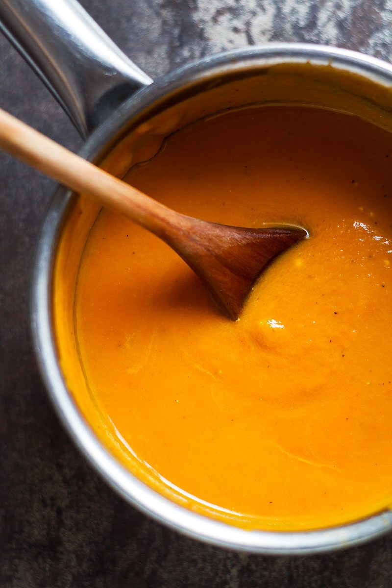 Creamy Carrot Soup with Caramelized Pecans — Super healthy and smooth with an irresistible bit of crunch!