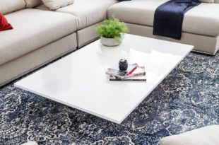 DIY Modern Coffee Table — The quickest and easiest DIY coffee table ever! Get a sleek, elegant look for your living room with an ultra low coffee table with an super glossy surface.