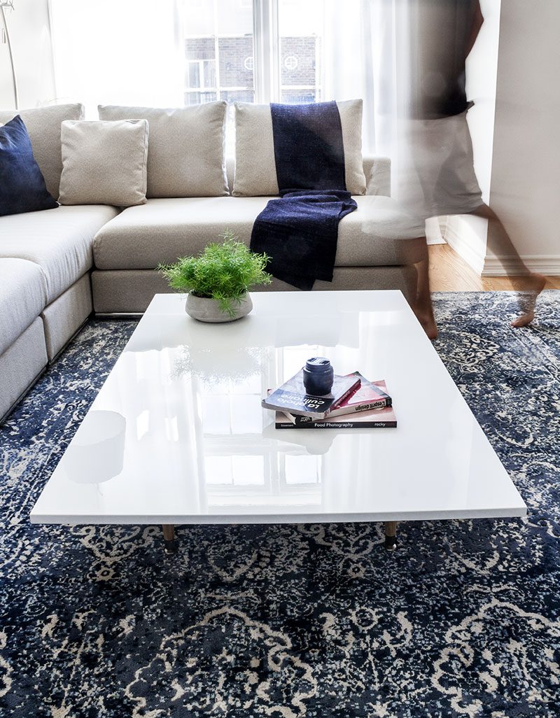 DIY High Gloss Coffee Table — The quickest and easiest DIY coffee table ever! Get a sleek, elegant look for your living room with an ultra low coffee table with an super glossy surface.