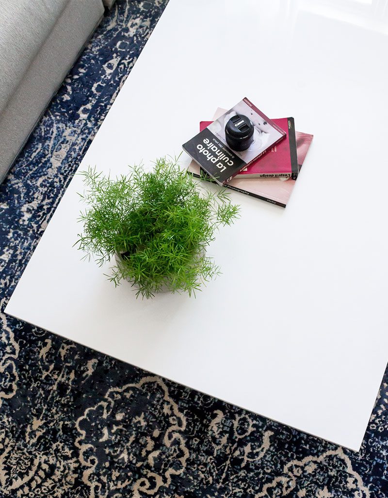 DIY High Gloss Coffee Table — The quickest and easiest DIY coffee table ever! Get a sleek, elegant look for your living room with an ultra low coffee table with an super glossy surface.