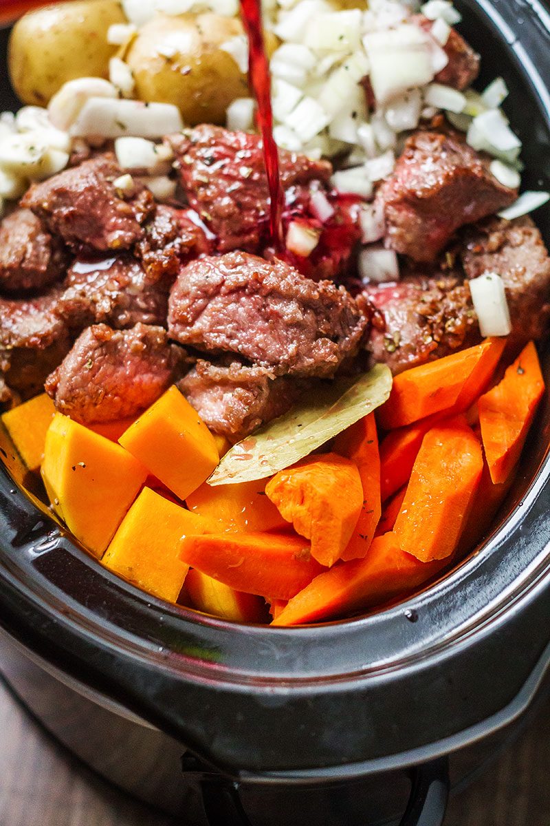 Slow Cooker Beef Stew — A hearty and delicious beef stew that is loaded with hearty veggies and incredible flavor!