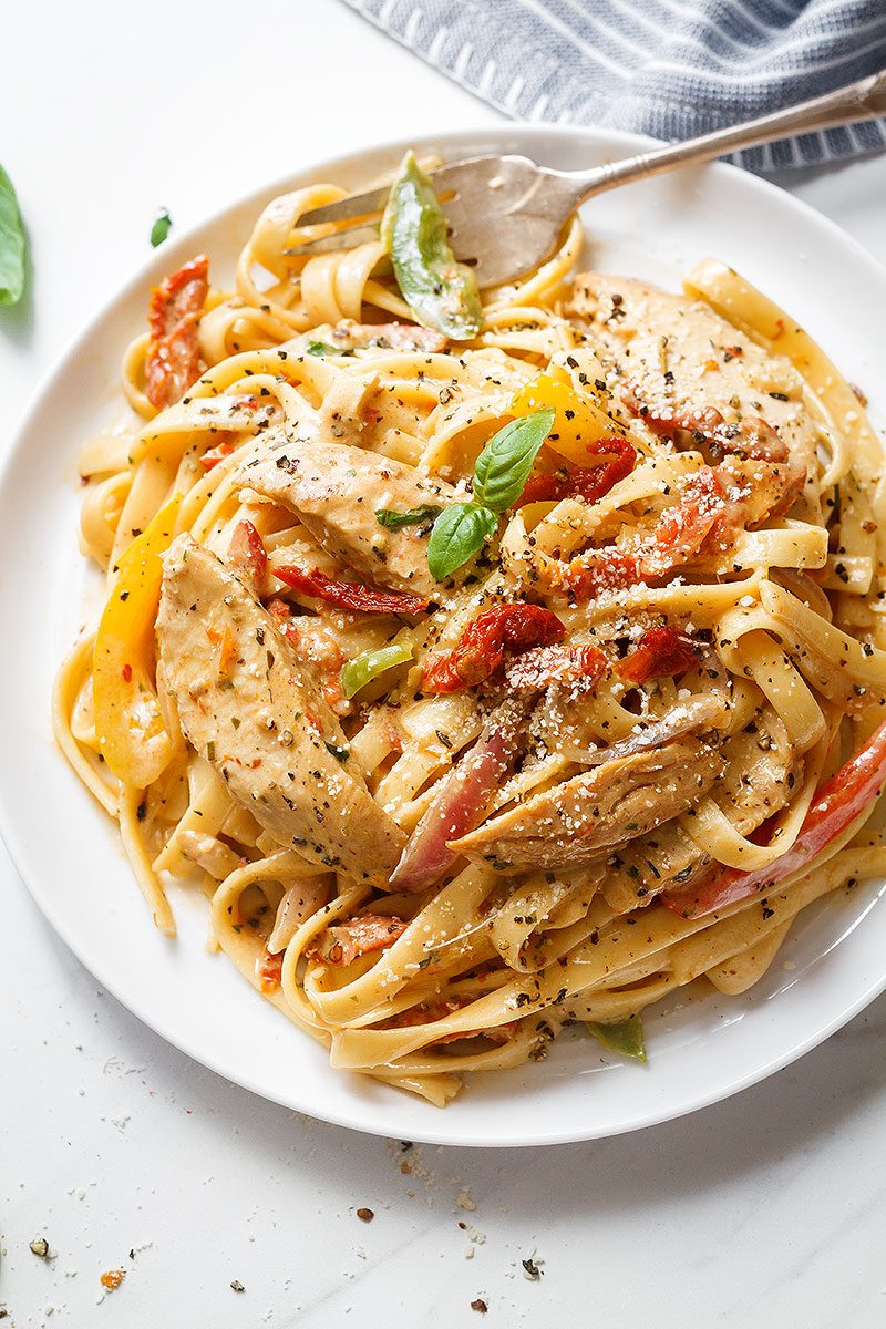 Chicken Pasta in Creamy Pesto Sun-Dried Tomato Sauce — A restaurant-style meal, packed with flavor and ready in 30 minutes.