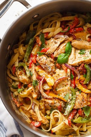 Chicken Pasta in Creamy Pesto Sun-Dried Tomato Sauce