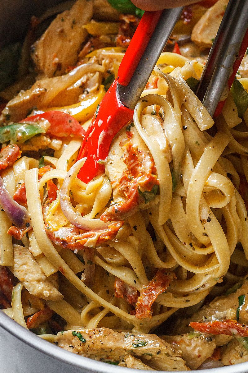 Chicken Pasta in Creamy Pesto Sun-Dried Tomato Sauce — A restaurant-style meal, packed with flavor and ready in 30 minutes.