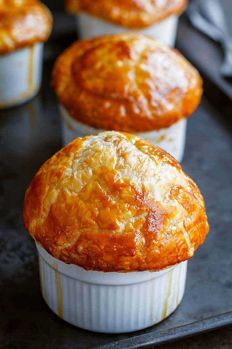 Creamy Chicken Pot Pie - Rich, flavorful with a golden brown crispy crust, these individual chicken pot pies are seriously comforting.