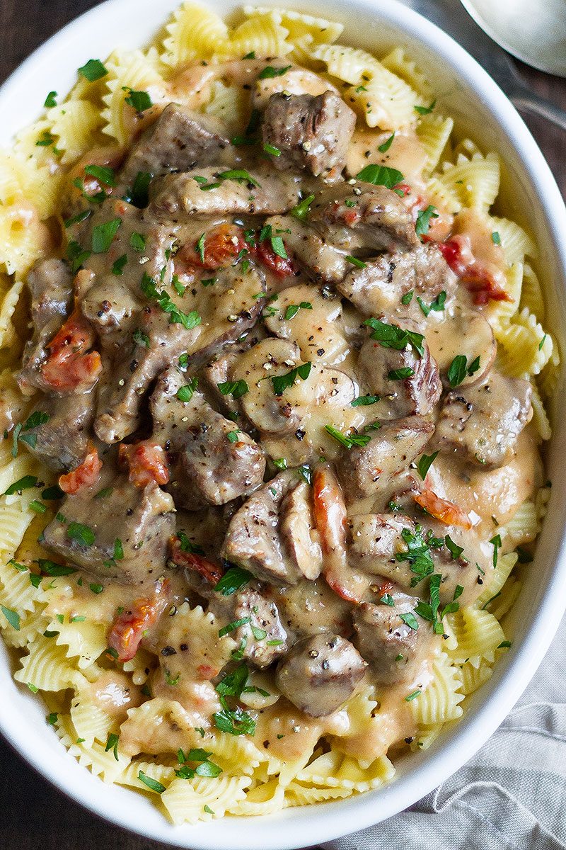 Beef Stroganoff – Delicious and nourishing slices of beef cooked with an amazing creamy mushroom and sun-dried tomato sauce. 