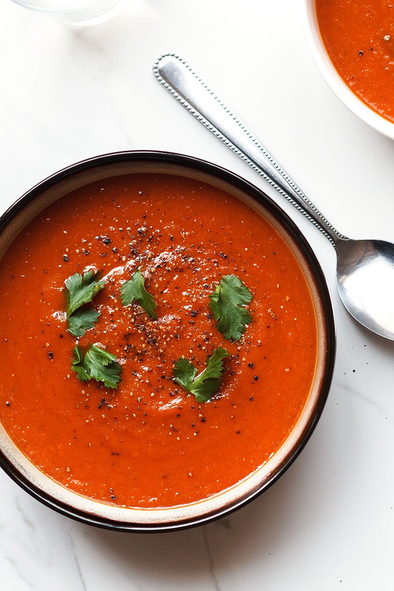 Curry Tomato Soup - A hearty, comforting roasted tomato soup full of incredible flavors. 