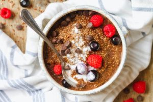 Chocolate Quinoa Breakfast Bowl - A simple, 4-ingredient breakfast bowl infused with almond milk flavor! Healthy, vegan, and gluten-free.
