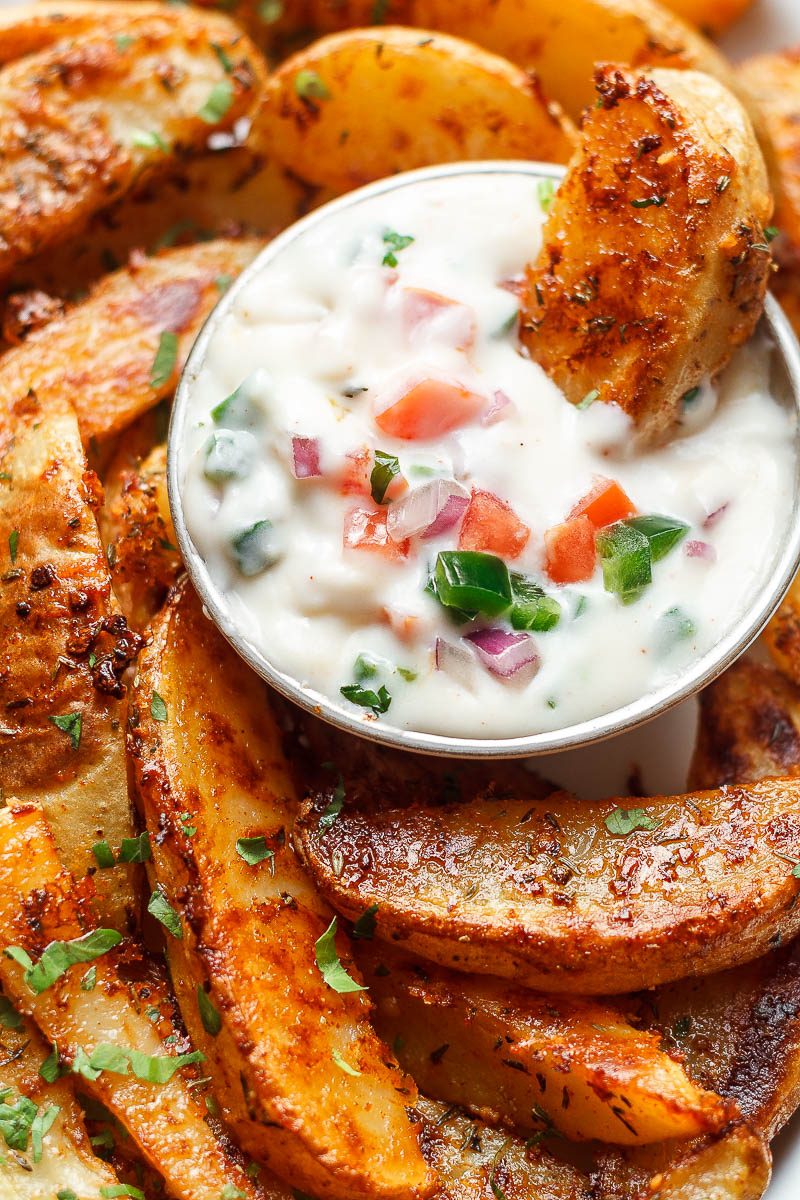 Baked Garlic Parmesan Potato Wedges - Crispy on the outside and tender on the inside, they will blow you away with their simplicity and fantastic flavor!