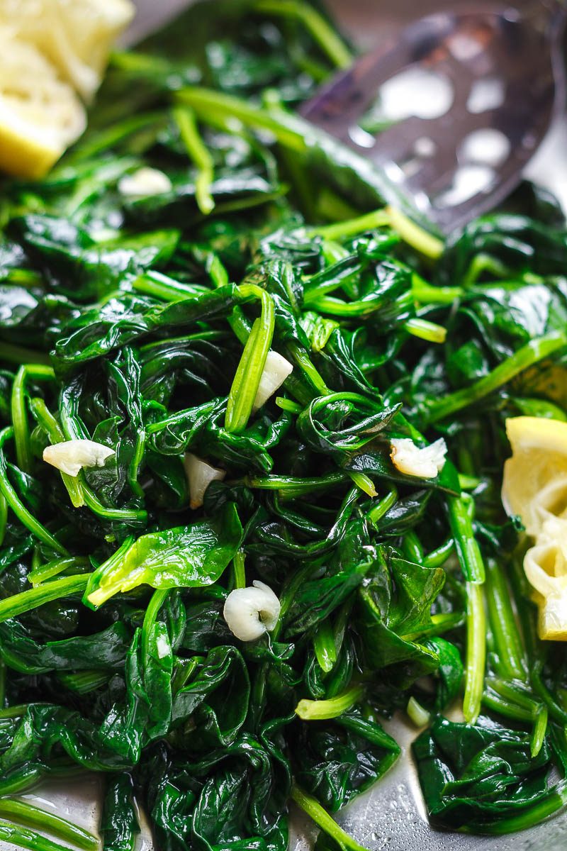 Garlic Butter Sauteed Spinach - A super easy and healthy recipe for a side everyone will love.