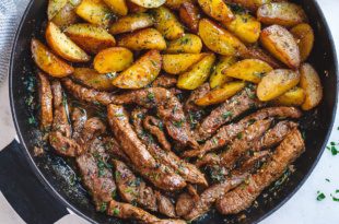 Garlic Butter Steak and Potatoes Skillet - This easy one-pan recipe is SO simple, and SO flavorful. The best steak and potatoes you'll ever have!