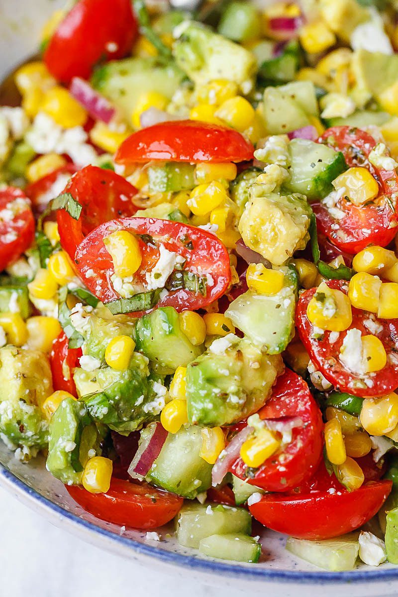 Avocado Feta Corn Salad Recipe - So much creaminess and flavor! This avocado corn salad is a light, yet satisfying meal.