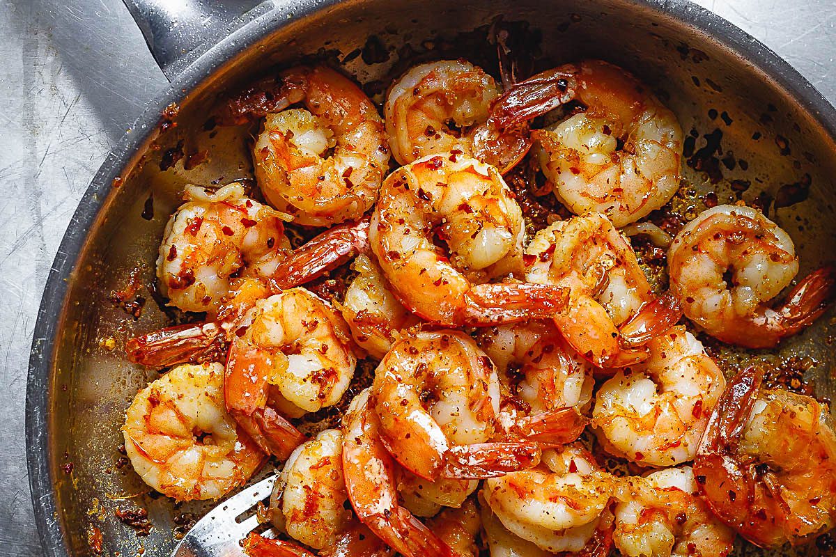 Make perfectly, buttery grilled shrimp with this cast iron shrimp pan