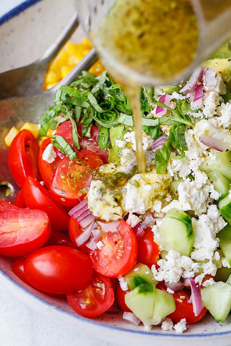 Avocado Feta Corn Salad Recipe - So much creaminess and flavor! This avocado corn salad is a light, yet satisfying meal.