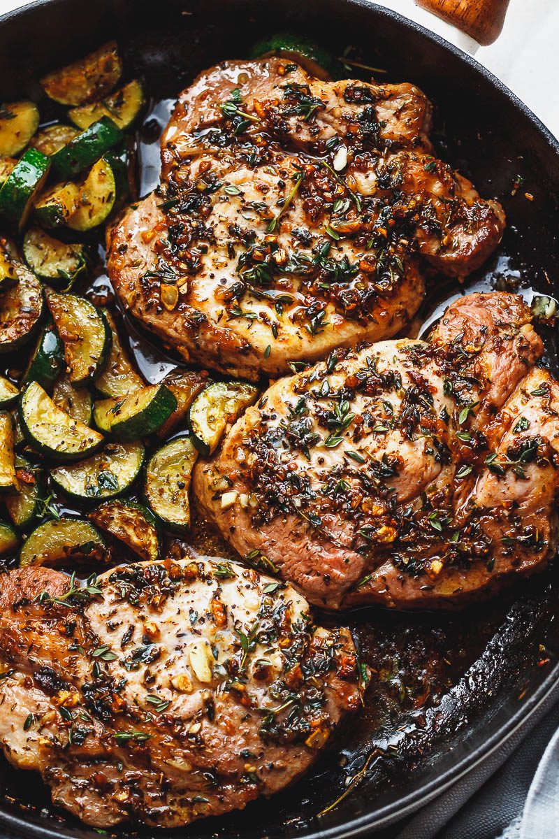Garlic Butter Herb Pork Chops with Zucchini - This complete Paleo meal is quick, easy and effortless!