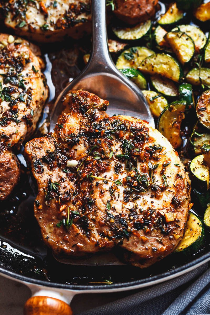 Garlic Butter Herb Pork Chops with Zucchini - This complete Paleo meal is quick, easy and effortless!