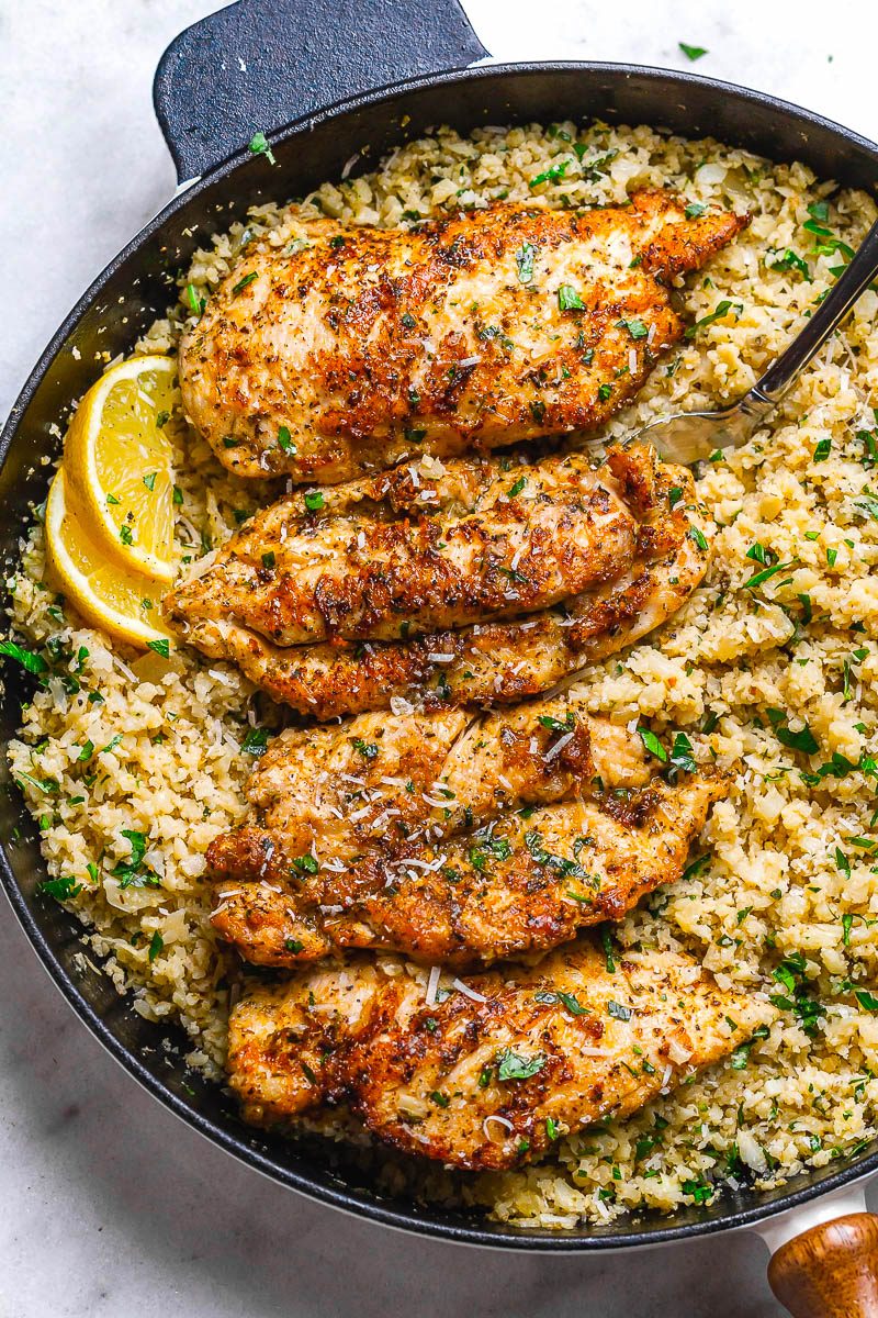 Garlic Butter Chicken with Parmesan Cauliflower Rice - #eatwell101 #recipe Crispy, soft and SO delish! Perfect for when you want to come home to a delicious gluten-free, low-carb dinner. #Garlic #Butter #Chicken #Parmesan #Cauliflower #Rice #glutenfree, l#owcarb #dinner.