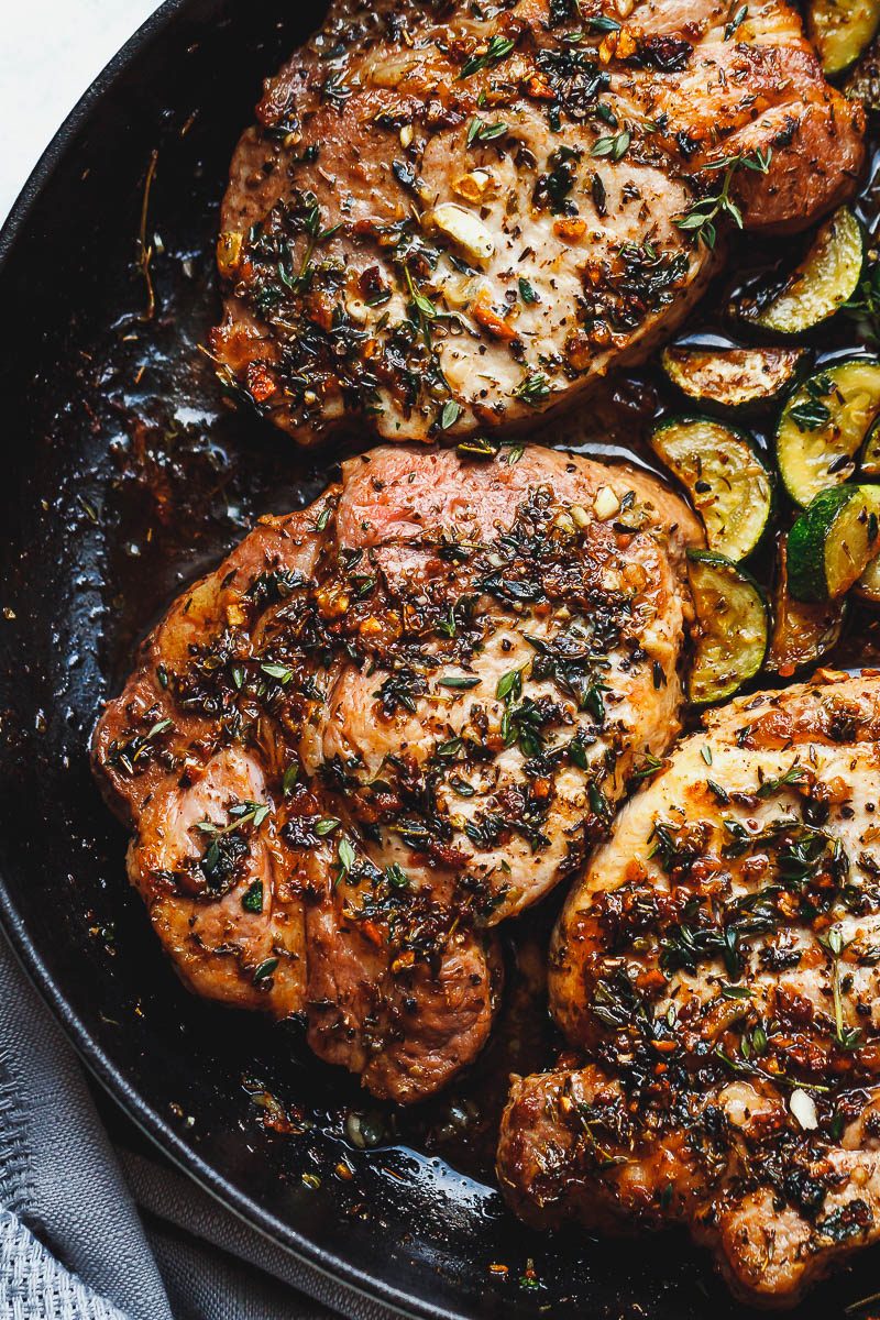 Garlic Butter Herb Pork Chops with Zucchini - This complete Paleo meal is quick, easy and effortless!